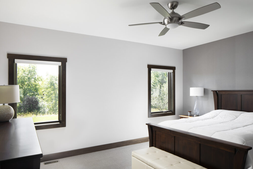 Primary bedroom in Waukesha custom ranch home